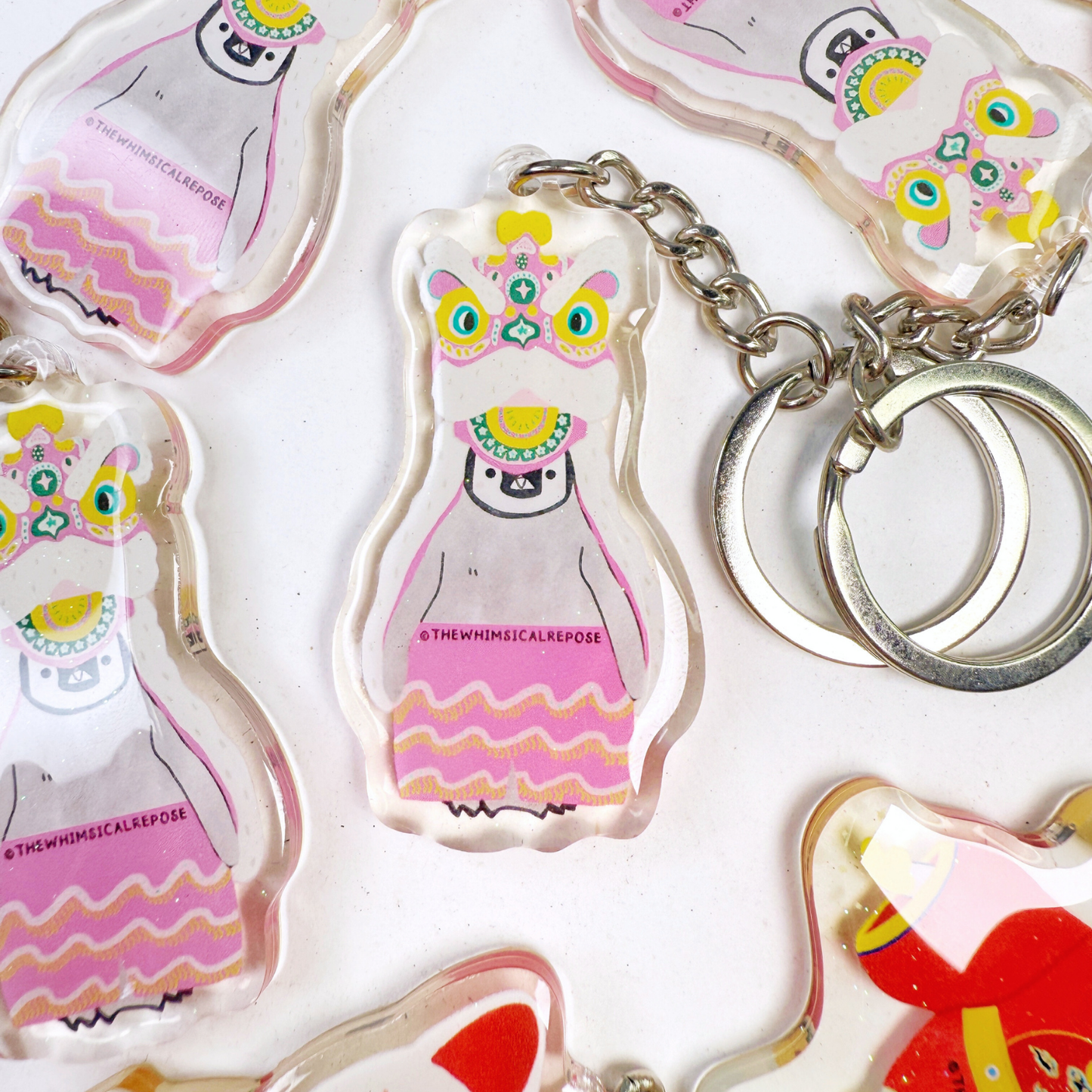 Pudding the Penguin Lion Dance Acrylic Keychain